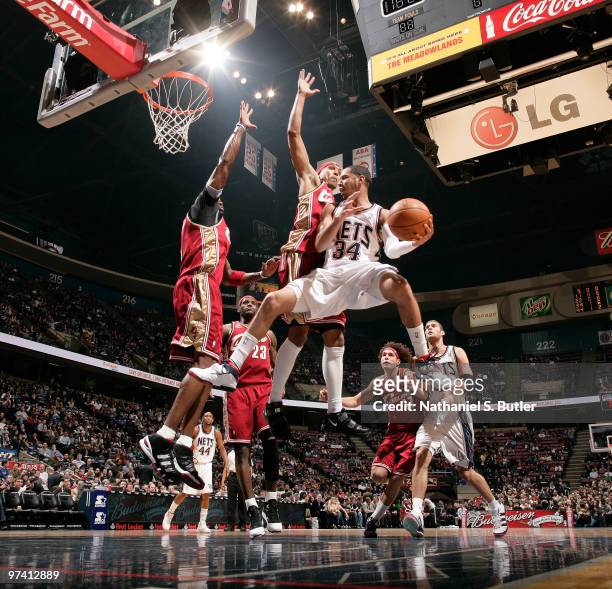 Devin Harris of the New Jersey Nets looks to pass against the Cleveland Cavaliers on March 3, 2010 at the IZOD Center in East Rutherford, New Jersey....