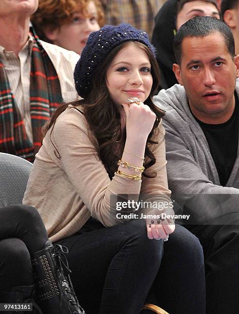 Michelle Trachtenberg and David Spencer attends the Detroit Pistons vs New York Knicks game at Madison Square Garden on March 3, 2010 in New York...