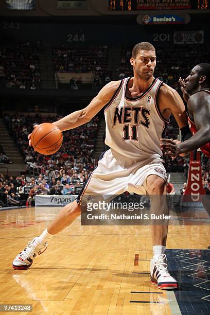 Brook Lopez of the New Jersey Nets posts up against the Cleveland Cavaliers on March 3, 2010 at the IZOD Center in East Rutherford, New Jersey. NOTE...