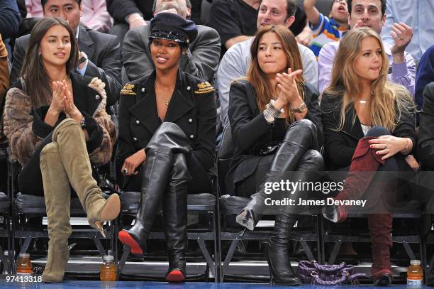 Irina Shayk, Jessica White, Jessica Gomes and Esti Ginzburg attend the Detroit Pistons vs New York Knicks game at Madison Square Garden on March 3,...