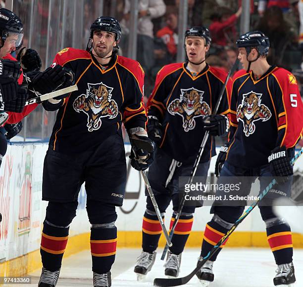 Jason Garrison of the Florida Panthers celebrates a goal with teammates against the Philadelphia Flyers at the BankAtlantic Center on March 3, 2010...