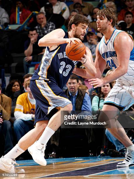 Marc Gasol of the Memphis Grizzlies drives against Aaron Gray of the New Orleans Hornets on March 3, 2010 at the New Orleans Arena in New Orleans,...
