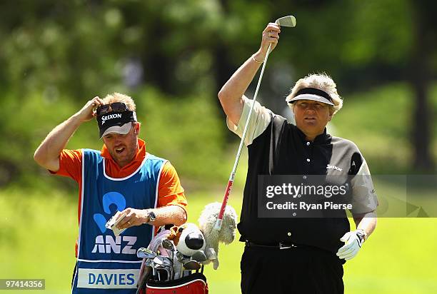 Laura Davies of England plays selects a club on the 8th hole during round one of the 2010 ANZ Ladies Masters at Royal Pines Resort on March 4, 2010...