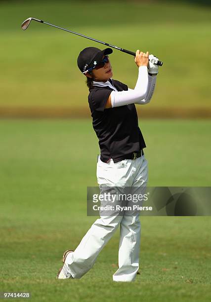 Eun Hee Ji of Korea plays an iron shot on the 8th hole during round one of the 2010 ANZ Ladies Masters at Royal Pines Resort on March 4, 2010 in Gold...