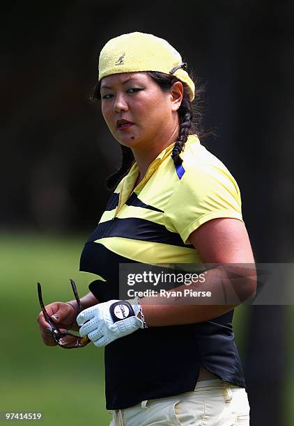 Christina Kim of the USA walks down the 8th fairway during round one of the 2010 ANZ Ladies Masters at Royal Pines Resort on March 4, 2010 in Gold...