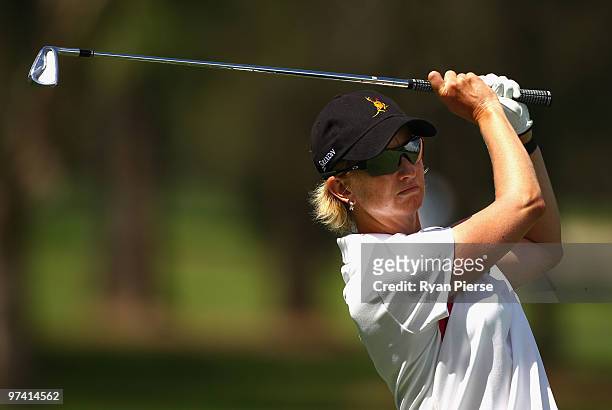Karrie Webb of Australia plays an iron shot on the 9th hole during round one of the 2010 ANZ Ladies Masters at Royal Pines Resort on March 4, 2010 in...
