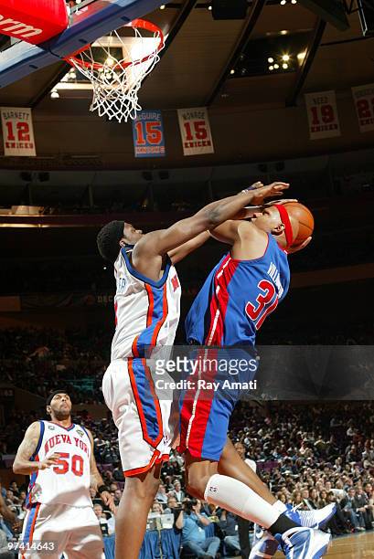 Bill Walker of the New York Knicks lblocks Charlie Villanueva of the Detroit Pistons during the game on March 3, 2010 at Madison Square Garden in New...