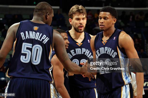 Zach Randolph, Mike Conley, Marc Gasol congratulate Rudy Gay of the Memphis Grizzlies after picking up a loose ball against the New Orleans Hornets...