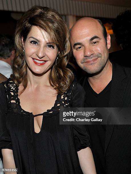 Actress Nia Vardalos and actor Ian Gomez attend Artists for Peace and Justice hosted by Vanity Fair and Brioni held at Bar Nineteen 12 on March 3,...