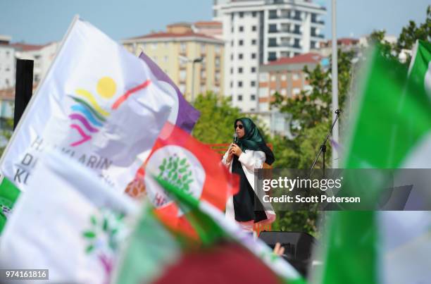 June 10: Under tight Turkish police security and behind a police fence, lawmaker Huda Kaya of the opposition, mainly Kurdish People's Democratic...