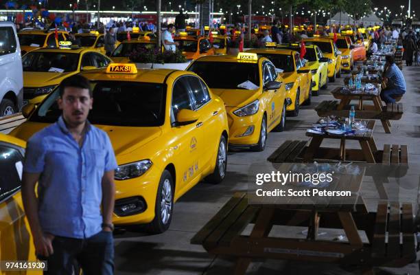 June 10: Turkish taxi drivers gather with their cars in protest at the presence of Uber in Turkey, at a late-night political rally addressed by Prime...