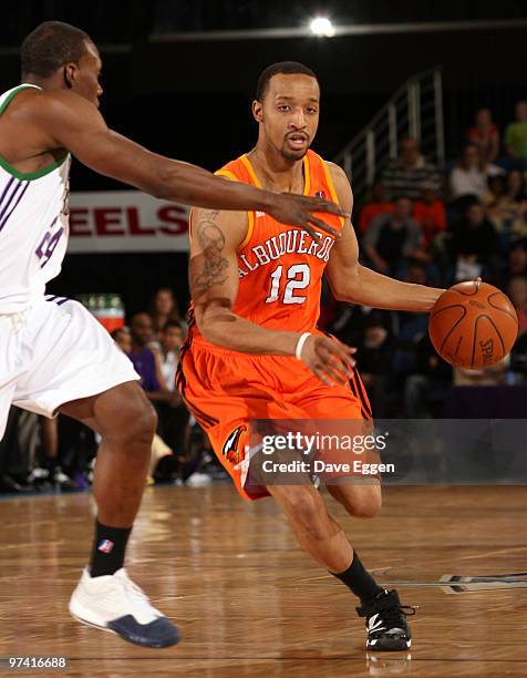 Jason Horton of the Albuquerque Thunderbirds drives against Lester Hudson of the Dakota Wizards in the first half of their NBA D-League game March 3,...