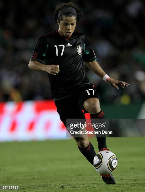 Giovani Dos Santos of Mexico controls the ball against New Zealand in an international friendly at the Rose Bowl on March 3, 2010 in Pasadena,...