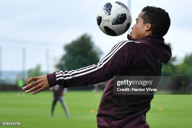 Giovani dos Santos of Mexico chests the ball during a training session at FC Strogino Stadium on June 12, 2018 in Moscow, Russia.