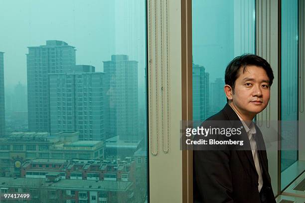 John Shi, chief executive officer of Arreon Carbon U.K. Ltd., poses for a portrait in Beijing, China, on Thursday, March 4, 2010. Arreon Carbon...