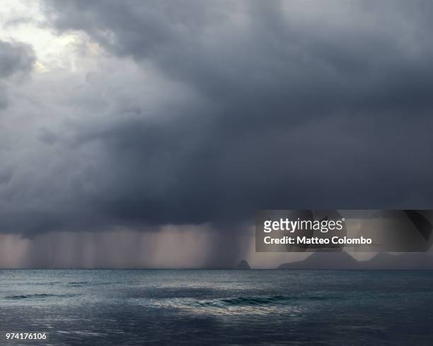 tropical storm in the caribbean sea - torrential rain ストックフォトと画像