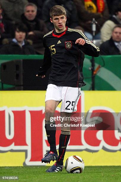 Thomas Mueller of Germany runs with the ball during the International Friendly match between Germany and Argentina at the Allianz Arena on March 3,...