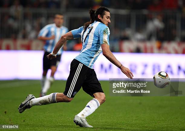 Jonas Gutierrez ofArgentina runs with the ball during the International Friendly match between Germany and Argentina at the Allianz Arena on March 3,...