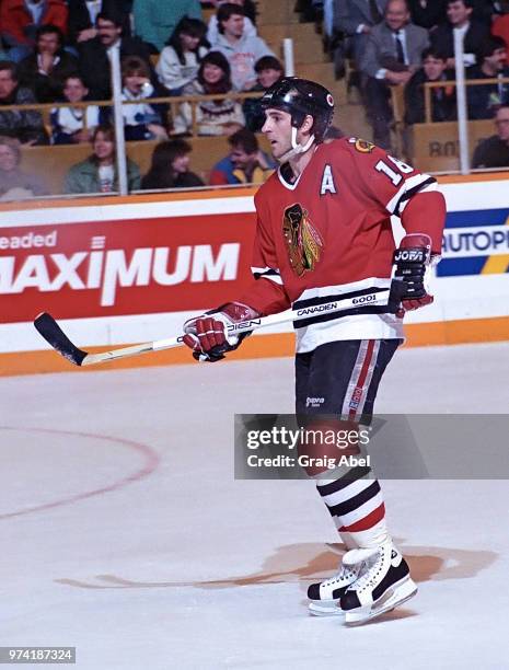 Denis Savard of the Chicago Black Hawks skates against the Toronto Maple Leafs during NHL game action on March 19, 1990 at Maple Leaf Gardens in...