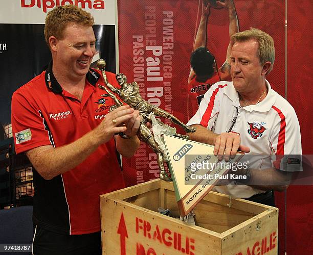 Rob Beveridge coach of the Wildcats and Gordie McLeod coach of the Hawks unpack the NBL Trophy during the NBL Grand Final Series launch at Challenge...
