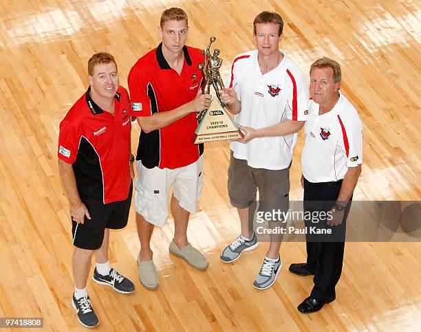 Rob Beveridge and Shawn Redhage of the Wildcats together with Gordie McLeod andMat Campbell captain of the Hawks pose with the NBL Trophy during the...