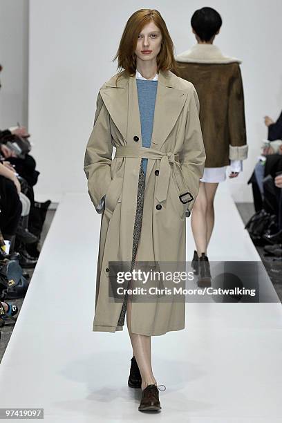 Model walks down the runway during the Margaret Howell fashion show, part of London Fashion Week, London on February 21, 2010 in London, England.