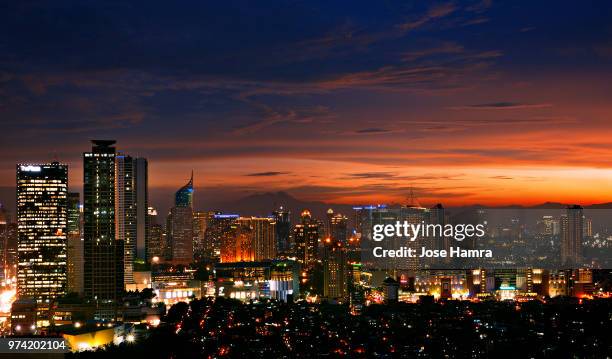 downtown district at night, jakarta, indonesia - hamra stock pictures, royalty-free photos & images