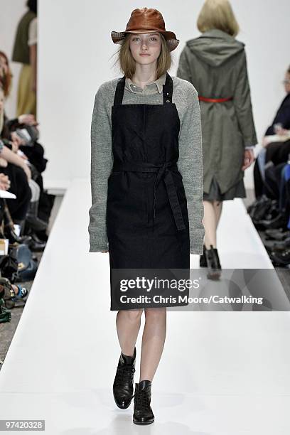 Model walks down the runway during the Margaret Howell fashion show, part of London Fashion Week, London on February 21, 2010 in London, England.