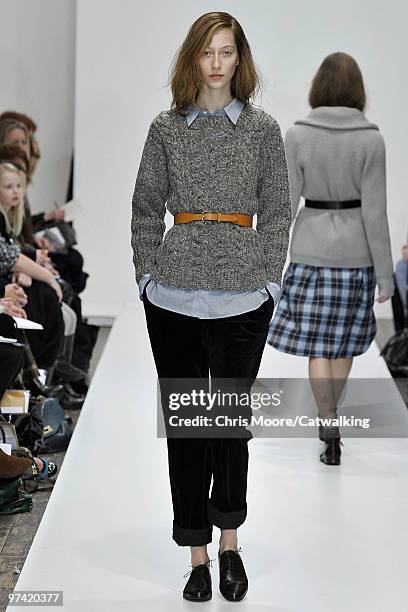 Model walks down the runway during the Margaret Howell fashion show, part of London Fashion Week, London on February 21, 2010 in London, England.