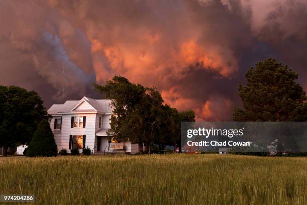 storm clouds over house, kansas, usa - kansas house stock pictures, royalty-free photos & images