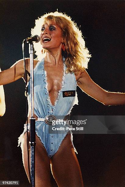 Jay Aston of Bucks Fizz performs on stage at Hammersmith Odeon on July 30th, 1982 in London, England.
