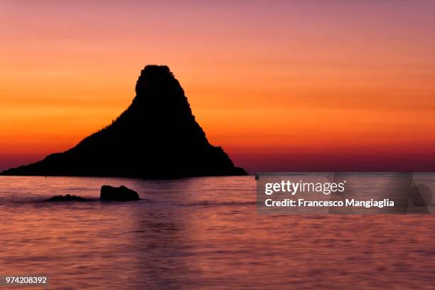 acitrezza sunrise.. - acitrezza stock pictures, royalty-free photos & images