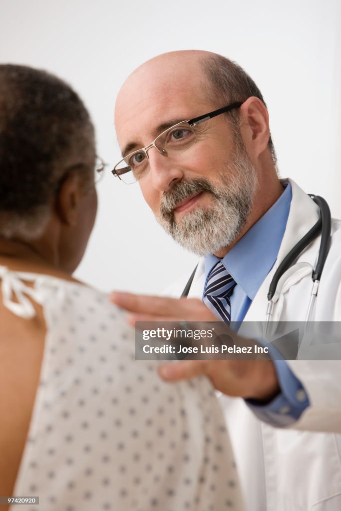 Doctor talking to patient