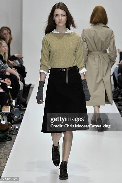 Model walks down the runway during the Margaret Howell fashion show, part of London Fashion Week, London on February 21, 2010 in London, England.