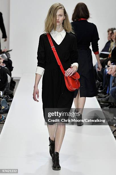 Model walks down the runway during the Margaret Howell fashion show, part of London Fashion Week, London on February 21, 2010 in London, England.