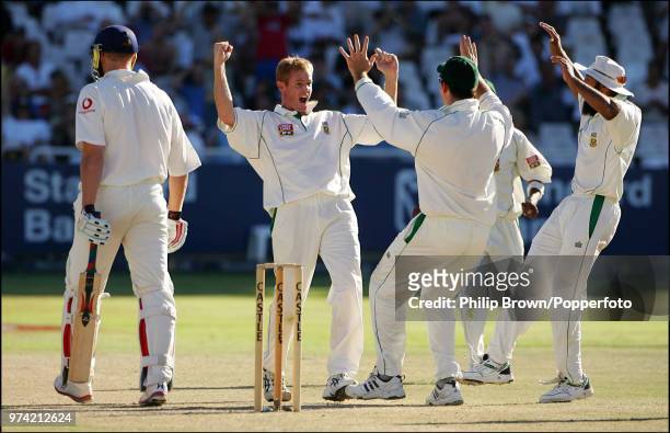 Shaun Pollock of South Africa celebrates after getting the wicket of England batsman Andrew Flintoff during the 3rd Test match between South Africa...
