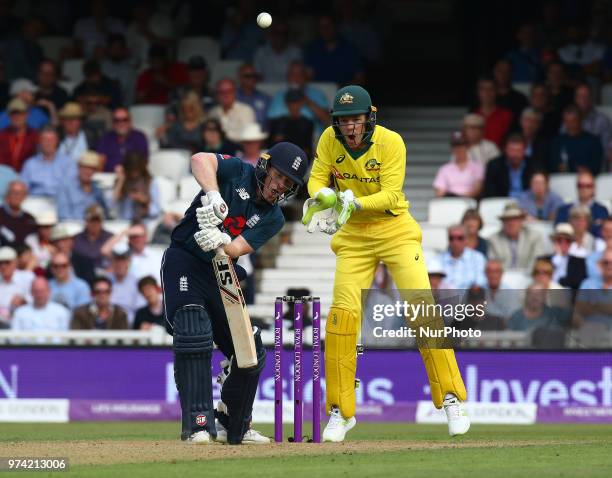 England's Eoin Morgan and Tim Paine of Australia during One Day International Series match between England and Australia at Kia Oval Ground, London,...