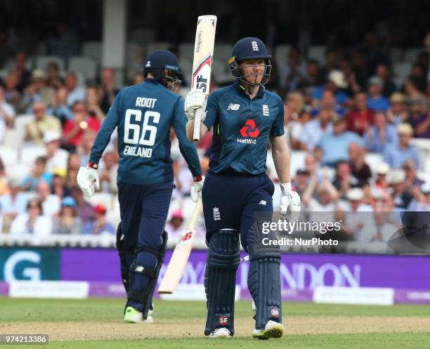 England's Eoin Morgan celebrates his half Century during One Day International Series match between England and Australia at Kia Oval Ground, London,...