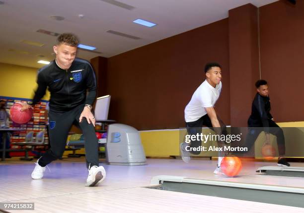Kieran Trippier of England and Jesse Lingard of England take part in some bowling during the England media access at Spartak Zelenogorsk Stadium...