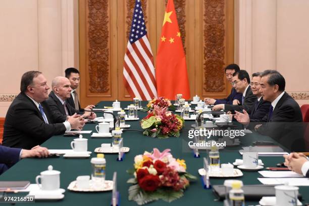 United States Secretary of State, Mike Pompeo speaks with Chinese Foreign Minister, Wang Yi during their meeting in the Great Hall of the People on...