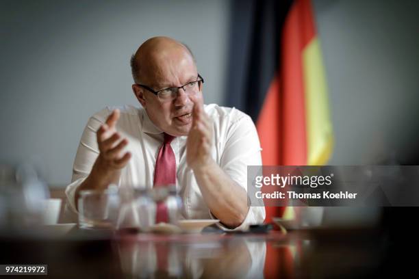 German Economy Minister Peter Altmaier speaks during an interview on June 12, 2018 in Berlin, Germany.