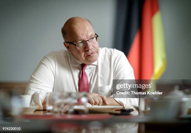 German Economy Minister Peter Altmaier speaks during an interview on June 12, 2018 in Berlin, Germany.