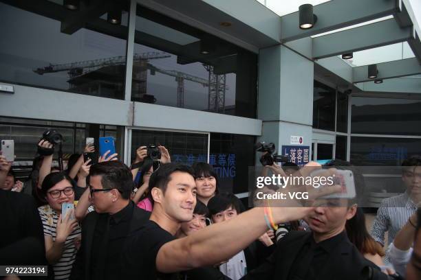 South Korean actor Choi Si-won arrives at airport on June 14, 2018 in Hong Kong, Hong Kong.