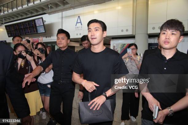South Korean actor Choi Si-won arrives at airport on June 14, 2018 in Hong Kong, Hong Kong.