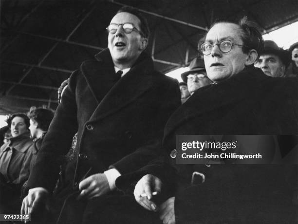 For Plymouth Devonport and Plymouth Argyle supporter, Michael Foot , watches his team play Huddersfield Town at Home Park, Plymouth, January 1953....