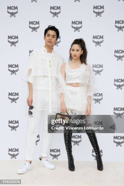 Takuro Ohno and Mayuko Kawakita attend the MCM Fashion Show Spring/Summer 2019 during the 94th Pitti Immagine Uomo on June 13, 2018 in Florence,...