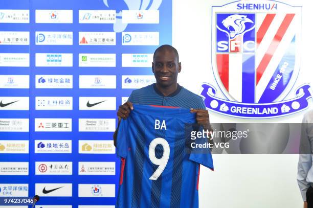 Shanghai Shenhua new signing Demba Ba attends a press conference on June 14, 2018 in Shanghai, China.