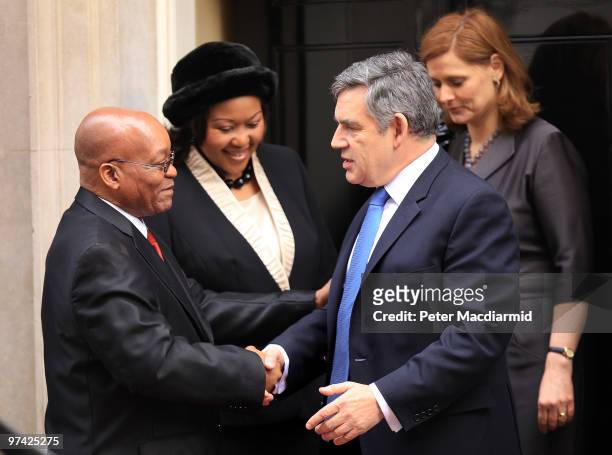 South African President Jacob Zuma and his wife Thobeka Madiba Zuma say goodbye to Prime Minister Gordon Brown and his wife Sarah Brown outside...