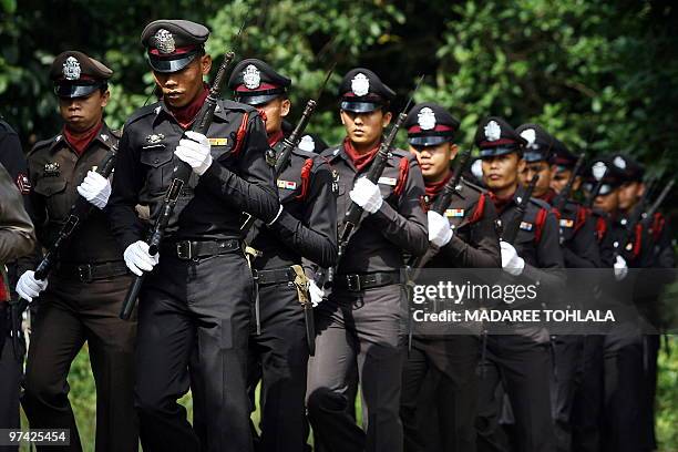 Thai police officers assemble ahead of the funeral ceremony of a Muslim colleague who was killed by suspected separatist militants on February 22 in...