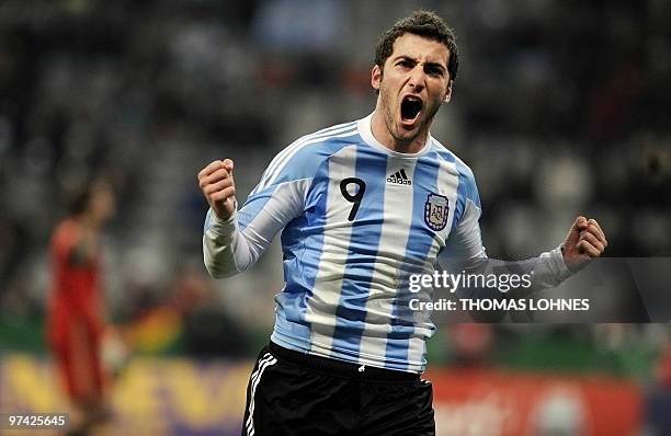 Argentina's forward Gonzalo Higuaín celebrates after scoring during the friendly football match Germany vs Argentina in the southern German city of...
